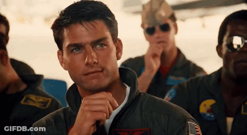 Men In Military Uniforms Sitting In A Row GIF