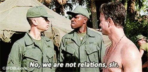 Men In Military Uniforms Standing And Talking GIF