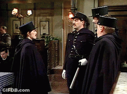 Men In Military Uniforms Standing Together GIF