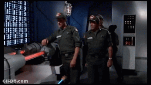 Men In Military Uniforms Standing GIF