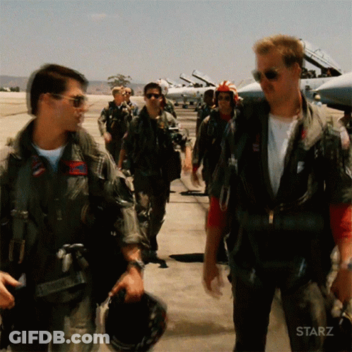Men In Military Uniforms Walking GIF