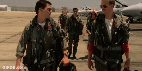 Men In Military Uniforms Walking GIF