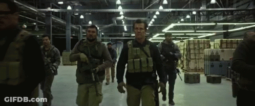 Men In Military Uniforms Walking GIF