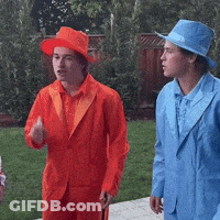 Men In Orange And Blue Suits GIF