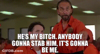 Men In Orange Jumpsuits Talking GIF