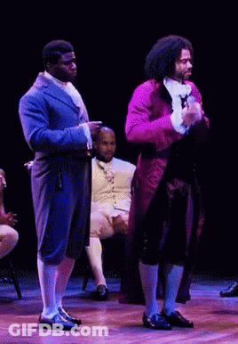 Men In Purple And Blue Suits GIF