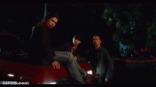 Men In Red Jacket And Black Shirt GIF