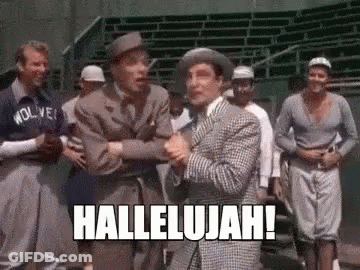 Men In Stadium One Holding Another's Hand GIF
