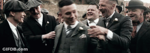 Men In Suits And Hats Laughing GIF