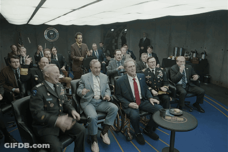 Men In Suits And Military Uniforms At Bush Stadium Table GIF