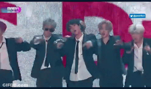Men In Suits And Ties Dancing On Stage GIF