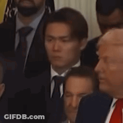 Men In Suits And Ties Standing Together GIF