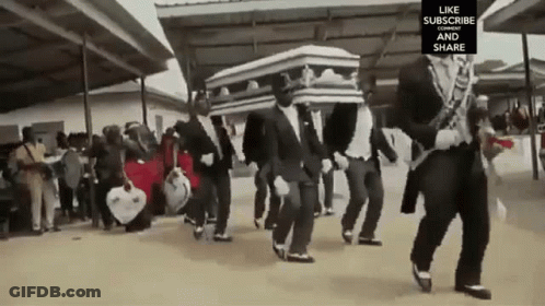 Men In Suits Carrying Coffins In Funeral Procession GIF