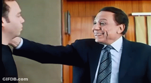 Men In Suits Hugging GIF