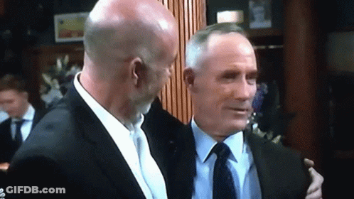 Men In Suits Hugging GIF