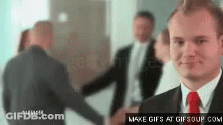 Men In Suits Shaking Hands GIF