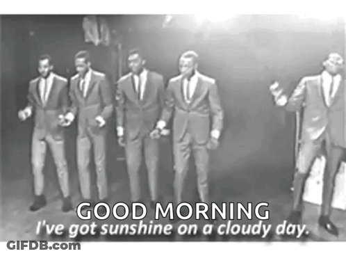 Men In Suits Singing Into Microphones GIF
