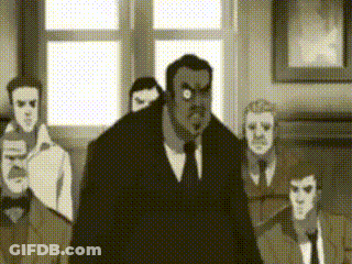 Men In Suits Standing Around Man GIF
