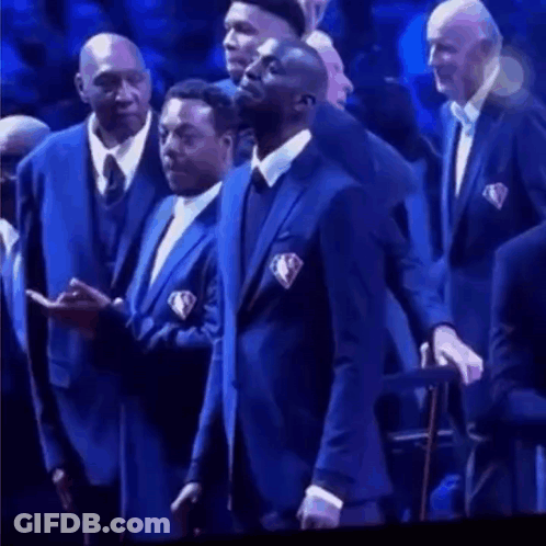 Men In Suits Standing In Front Of Crowd GIF