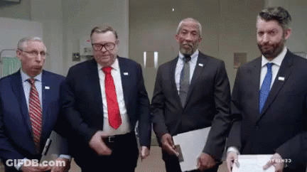 Men In Suits Standing Together Central Florida GIF