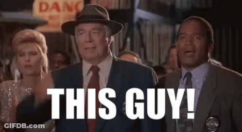 Men In Suits Standing Together GIF