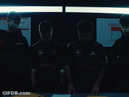 Men In Thief Shirts Standing GIF