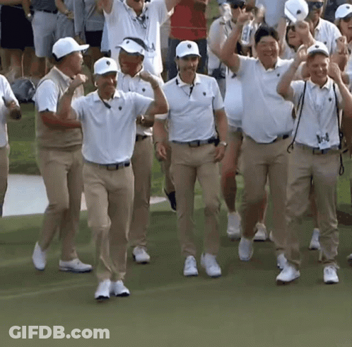 Men In White And Khaki Walking On Green Field GIF