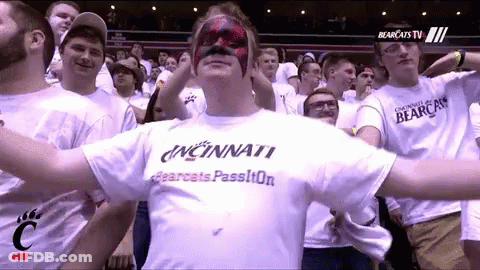 Men In White Uniforms Dancing With Blame These Queers Sign GIF