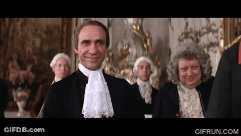 Men In Wigs Smiling In Front Of Gifrun.com Screen GIF