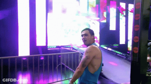 Men In Wrestling Ring With Impact Sign GIF