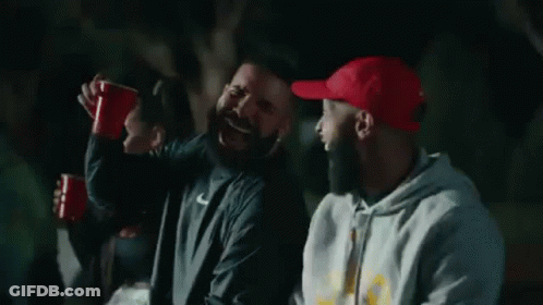 Men Laughing Holding Red Cups GIF