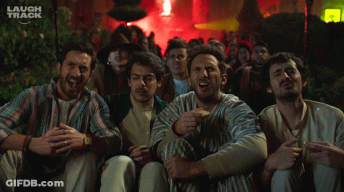 Men Laughing In Front Of Laugh Track Sign GIF