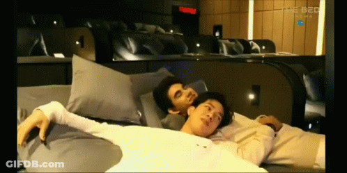 Men Laying On Bed Saying The Bed GIF