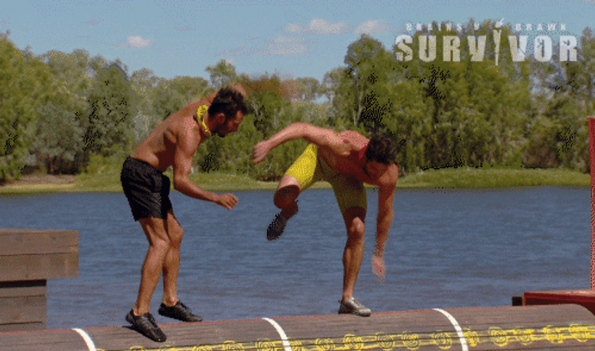 Men Lose Balance On Spinning Platform GIF