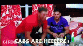 Men On Couch Saying Cabs Are Heeere GIF