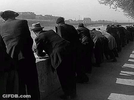 Men On Sidewalk Looking At River GIF