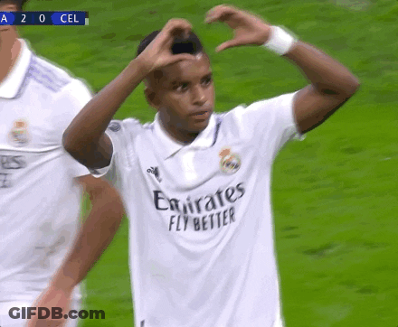 Men On Soccer Field One Wearing Emirates Shirt GIF