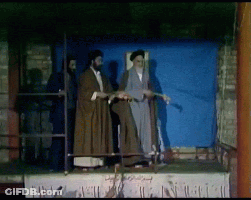 Men On Stage Blue Background GIF