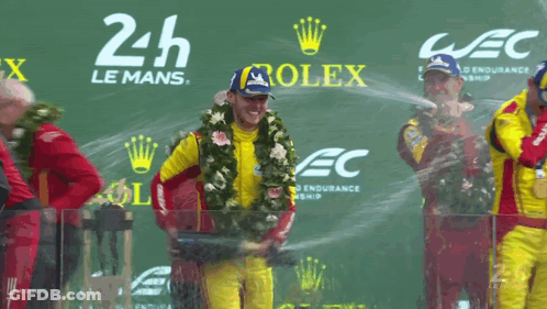 Men On Stage With Rolex Ads GIF