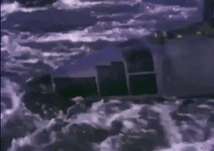 Men On Top Of A Submarine GIF