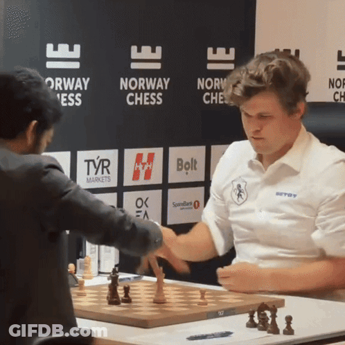 Men Playing Chess In Front Of Norway Chess Sign GIF