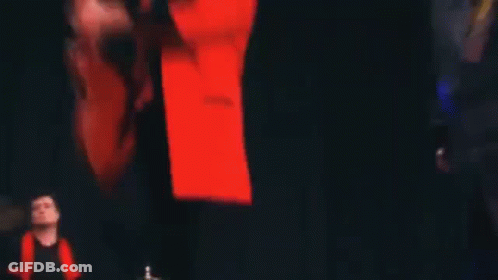 Men Playing Guitars And Singing In Dark Room GIF