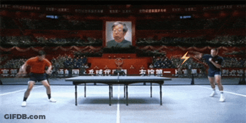 Men Playing Ping Pong In Front Of Crowd GIF
