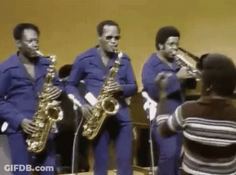 Men Playing Saxophones In Band GIF
