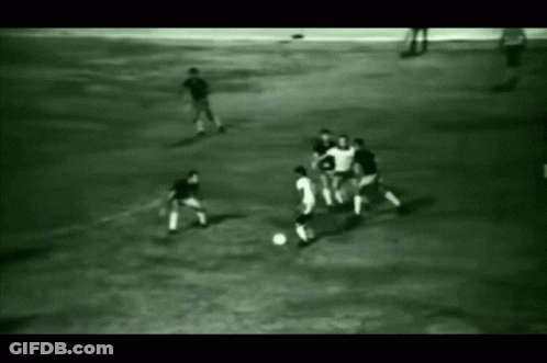 Men Playing Soccer Number 3 GIF