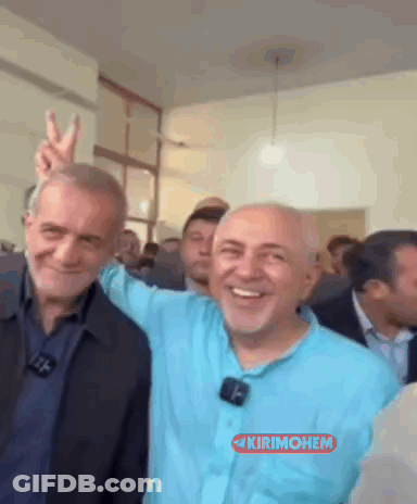 Men Posing One In Blue Shirt With Microphone GIF