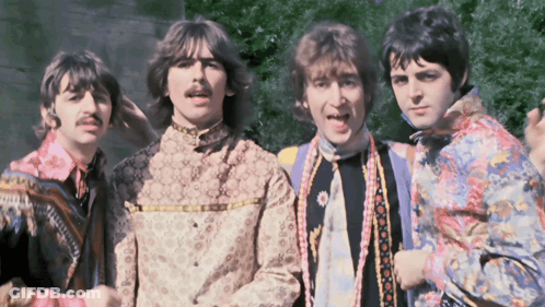 Men Posing, One In Colorful Shirt GIF