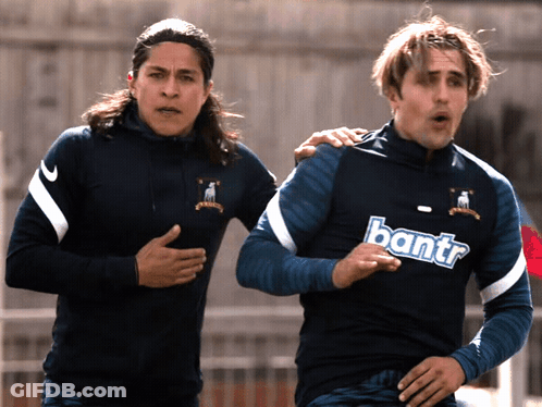 Men Running One Wears Bantra Shirt GIF