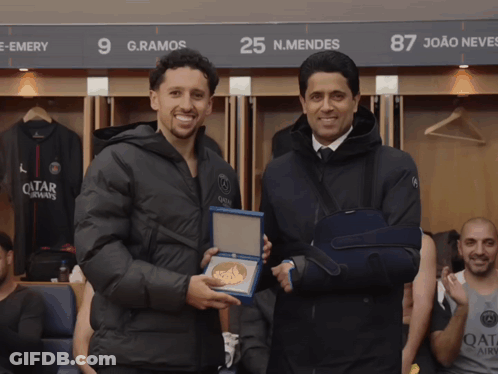 Men Shaking Hands: Qatar Airways And Black Jacket GIF