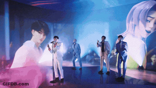 Men Singing Into Microphones GIF